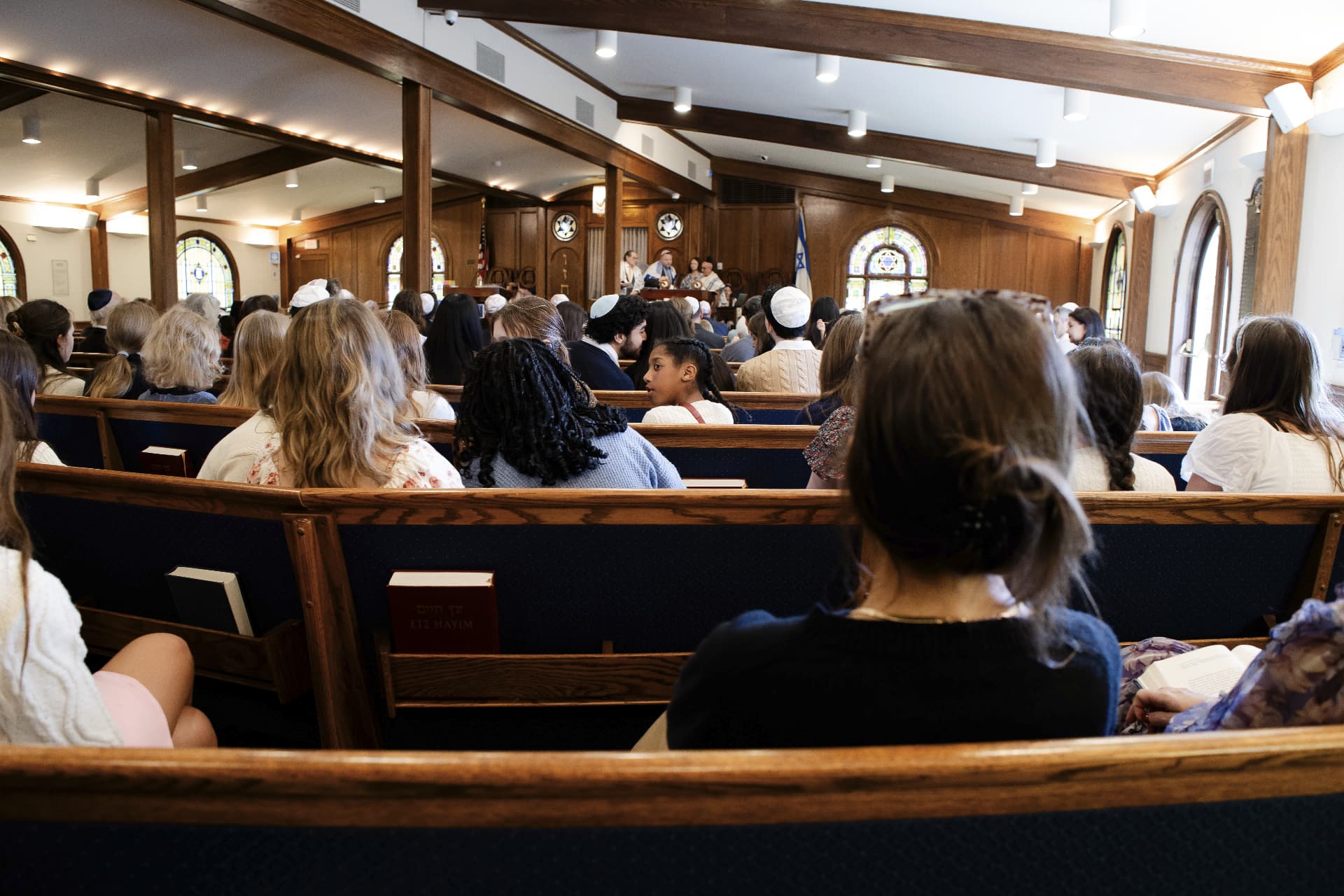 Congregants seated in the Adat Shalom sanctuary during Shabbat services
